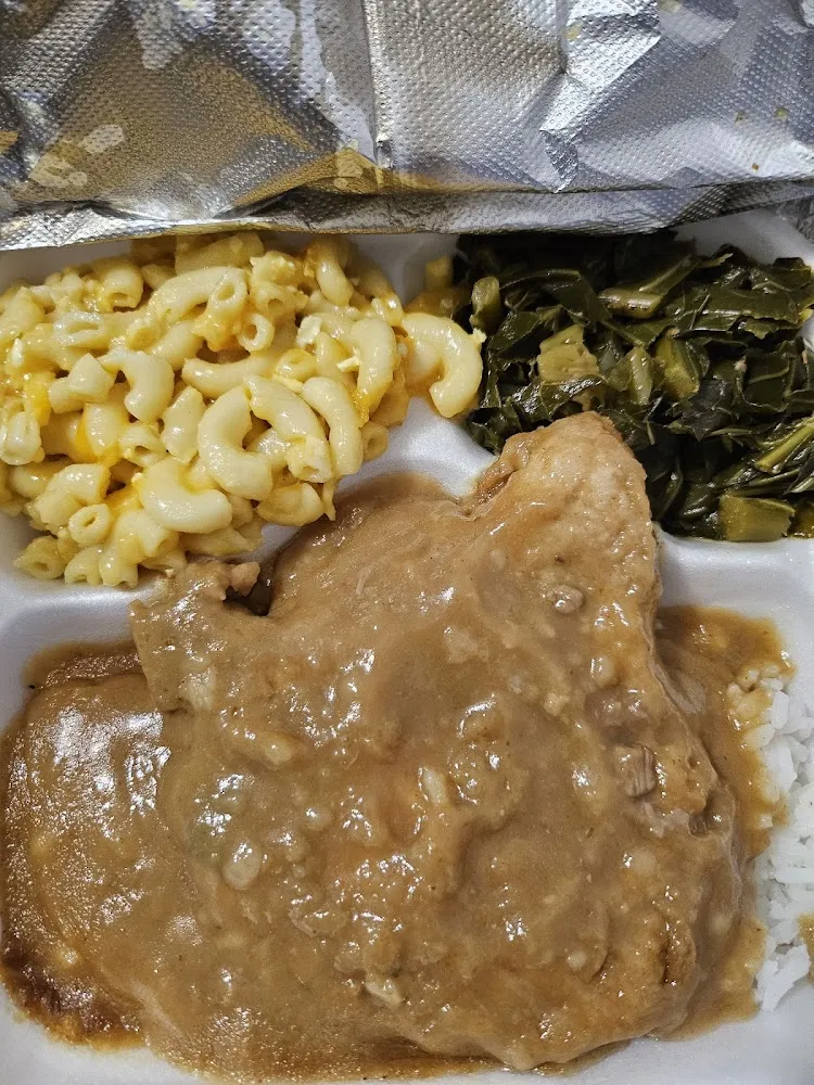 Smothered Pork Chops with Collard Greens and Mac and Cheese